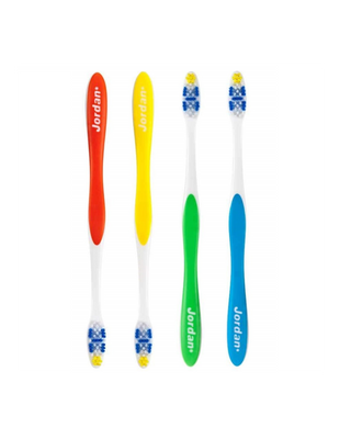 Multi-functional Total Clean Medium toothbrush to clean teeth and mouth Jordan