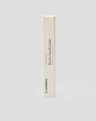 Smilebite bamboo toothbrush with white nylon bristles, suitable for vegans