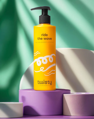 Twisty emollient conditioner for curly hair with rose and hemp oil